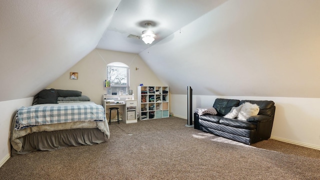 carpeted bedroom with ceiling fan and lofted ceiling