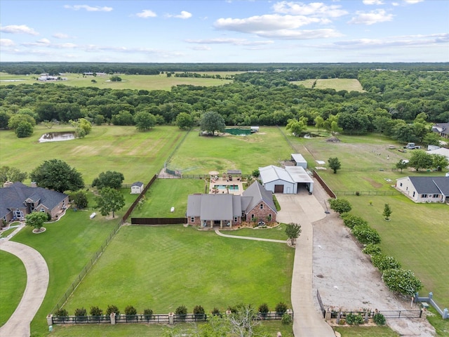 birds eye view of property with a rural view