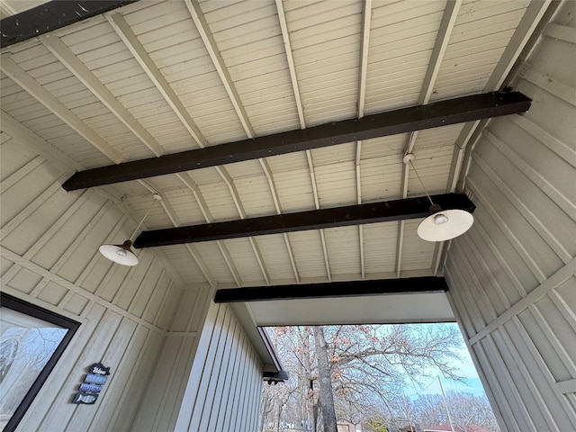 bathroom featuring beam ceiling