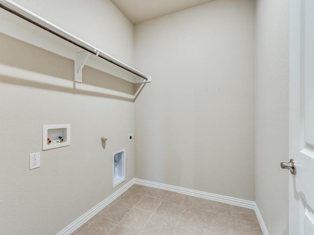 clothes washing area featuring washer hookup, hookup for an electric dryer, and hookup for a gas dryer