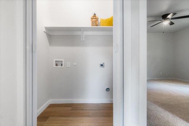 washroom featuring wood-type flooring, hookup for a gas dryer, ceiling fan, hookup for a washing machine, and hookup for an electric dryer