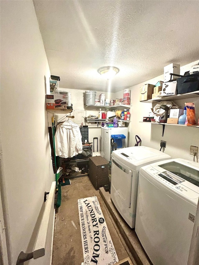 2709 Old Anson Rd, Abilene, TX 79603 - laundry room with separate washer and dryer and a textured ceiling