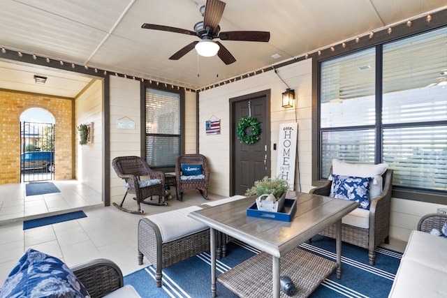 view of patio / terrace with an outdoor living space and ceiling fan