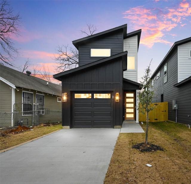 view of front of home with a garage