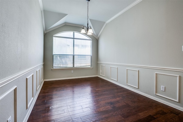 unfurnished room featuring crown molding, dark hardwood / wood-style flooring, a chandelier, and vaulted ceiling