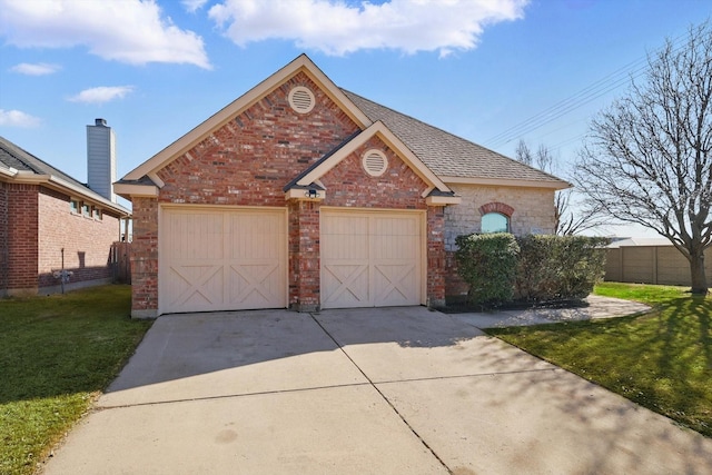 view of front facade featuring a front lawn, brick siding, driveway, and roof with shingles