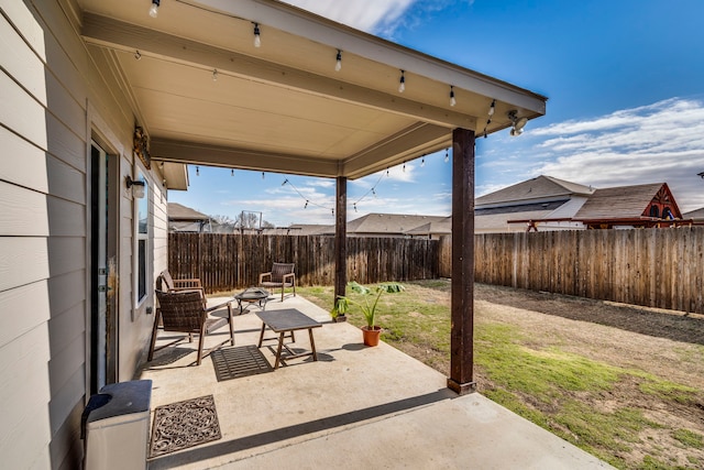 view of patio with a fire pit