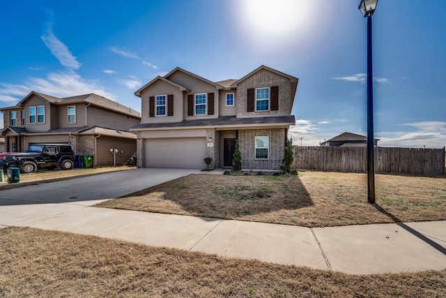 317 Countryside Dr, Aubrey, TX 76227 - view of front of property with brick siding, a garage, and concrete driveway