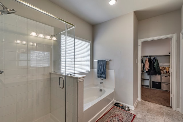 317 Countryside Dr, Aubrey, TX 76227 - full bath featuring a spacious closet, a bath, a stall shower, and baseboards