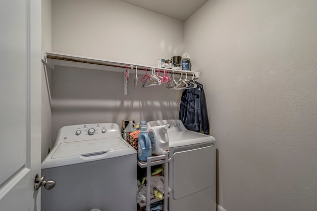 washroom with washer and clothes dryer