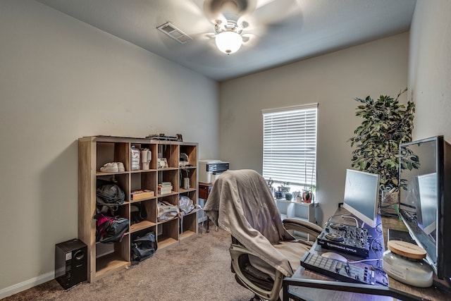 office space with carpet flooring and ceiling fan