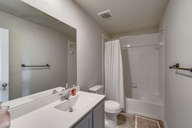 full bathroom with shower / tub combo with curtain, vanity, and toilet