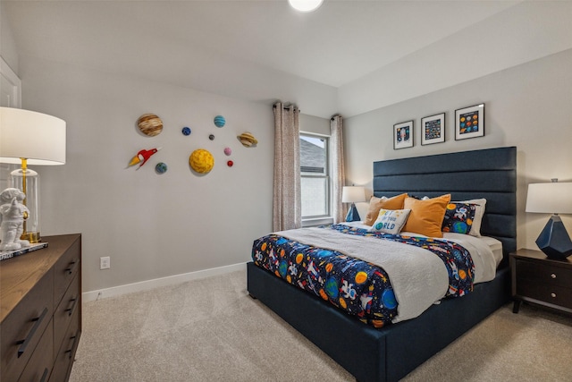 bedroom with light colored carpet