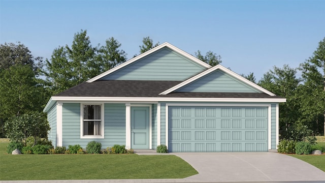 view of front of property featuring a garage and a front yard