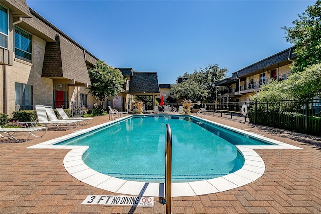 view of pool with a patio area