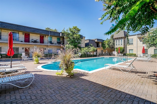 view of pool featuring a patio area