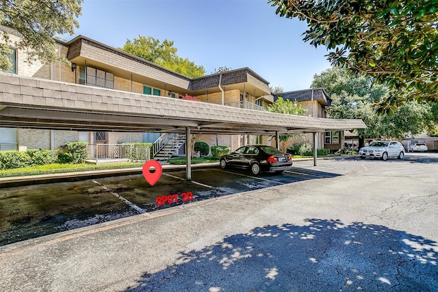 view of parking featuring a carport