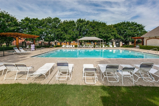 view of swimming pool with a gazebo