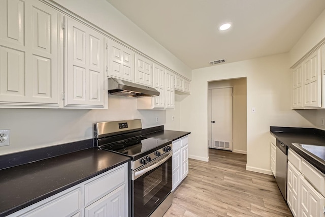 kitchen with stainless steel appliances, white cabinets, and light wood-type flooring