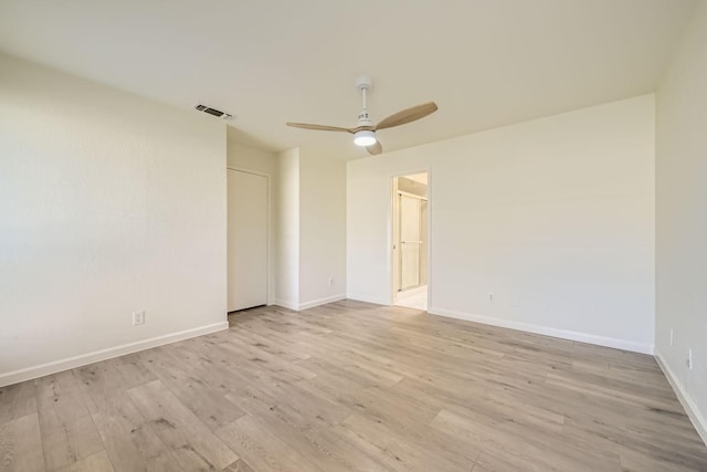 unfurnished room with ceiling fan and light hardwood / wood-style flooring