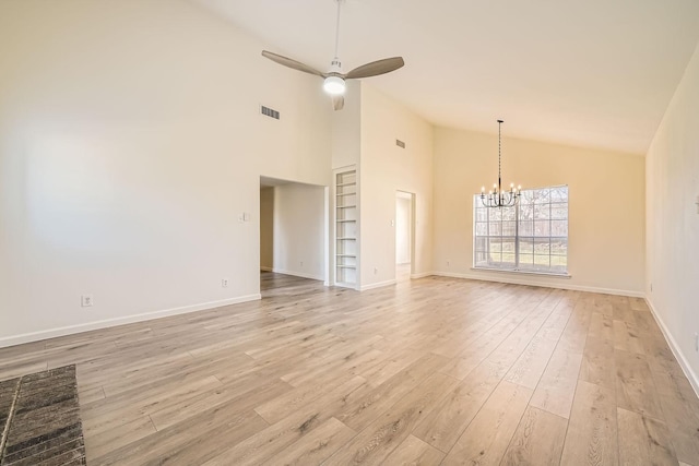 interior space with ceiling fan with notable chandelier, built in features, high vaulted ceiling, and light hardwood / wood-style floors