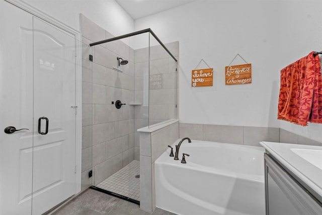 bathroom featuring shower with separate bathtub and vanity