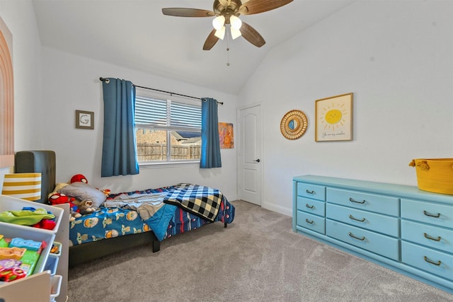 bedroom with light carpet, vaulted ceiling, and ceiling fan