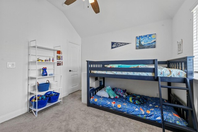 bedroom featuring lofted ceiling, light carpet, and ceiling fan