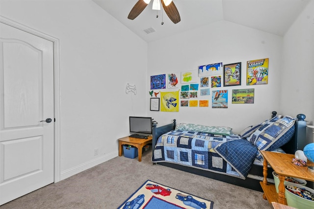 bedroom with vaulted ceiling, carpet floors, and ceiling fan