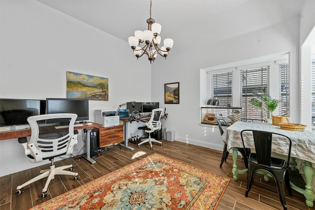 office space featuring a chandelier