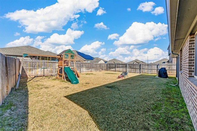 view of play area with a lawn