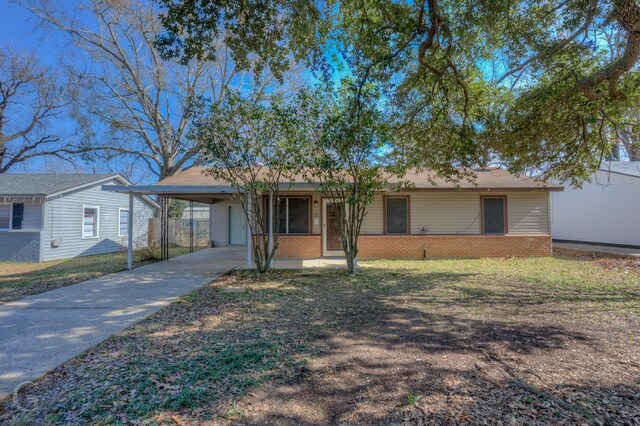 rear view of property with cooling unit, a patio, and a lawn