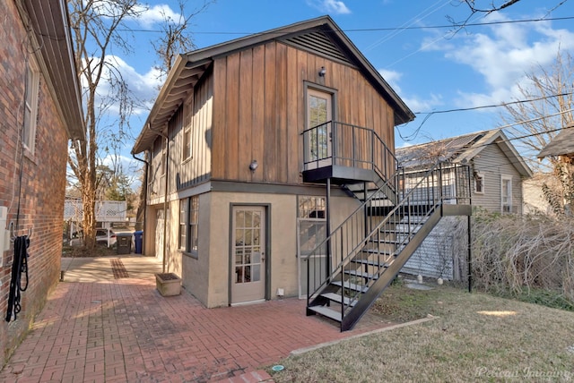 rear view of property with a patio area