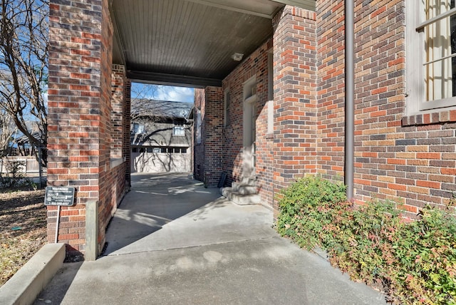 view of exterior entry featuring a garage