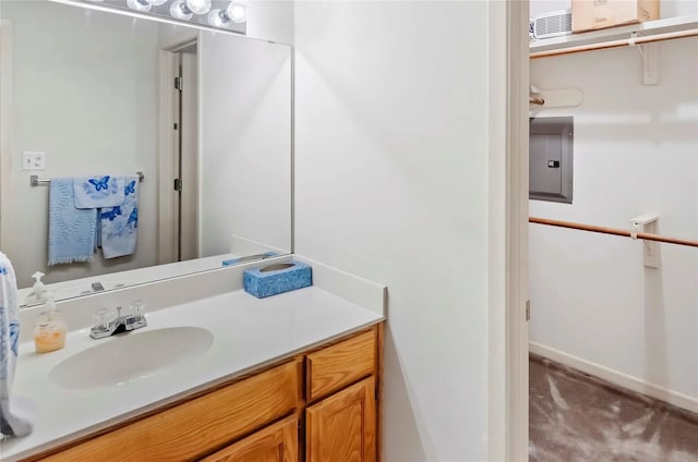 bathroom with vanity and electric panel