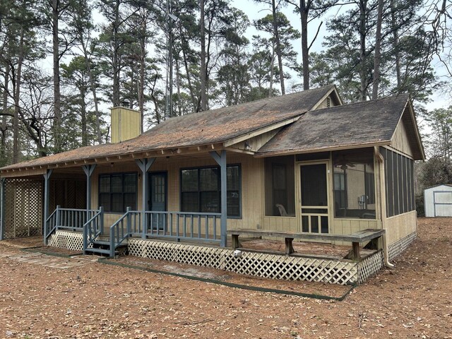 view of home's exterior with a carport