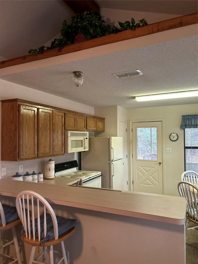 carpeted living room featuring vaulted ceiling with beams and ceiling fan