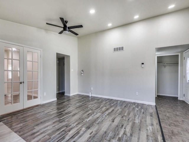 interior space with ceiling fan, light wood-type flooring, and french doors