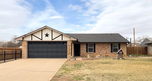 view of front of property featuring a garage and a front lawn