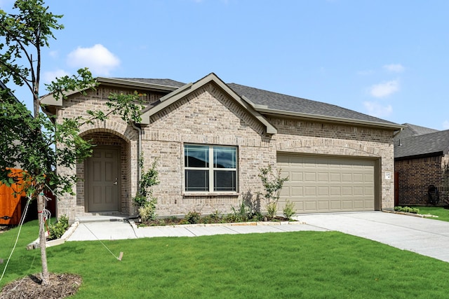 3219 Blossom Trl, Crandall, TX 75114 - french provincial home featuring brick siding, a garage, a front yard, driveway, and a shingled roof