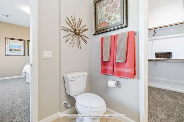 bathroom featuring toilet