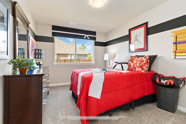 bedroom featuring light colored carpet