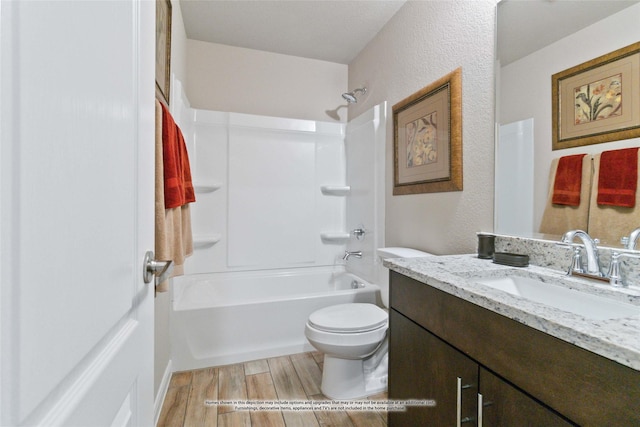 full bathroom with vanity, shower / bathtub combination, and toilet