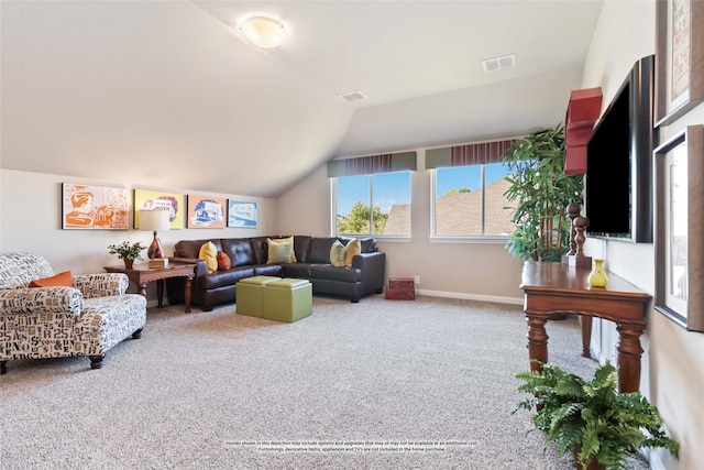 living room featuring carpet floors and vaulted ceiling