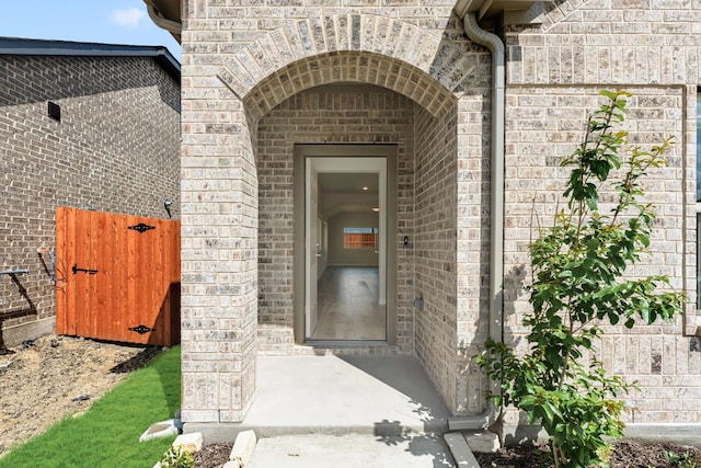 3219 Blossom Trl, Crandall, TX 75114 - doorway to property featuring brick siding and stone siding