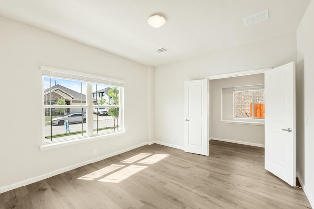3219 Blossom Trl, Crandall, TX 75114 - unfurnished bedroom featuring light wood finished floors and baseboards