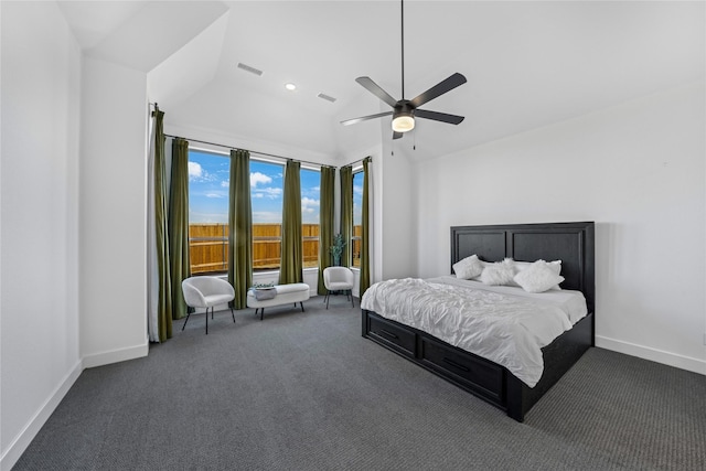 bedroom with lofted ceiling, ceiling fan, and dark colored carpet