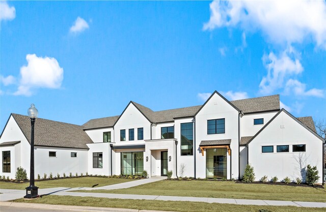 modern farmhouse with a front yard