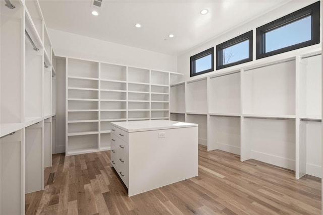 walk in closet featuring visible vents and light wood-style floors