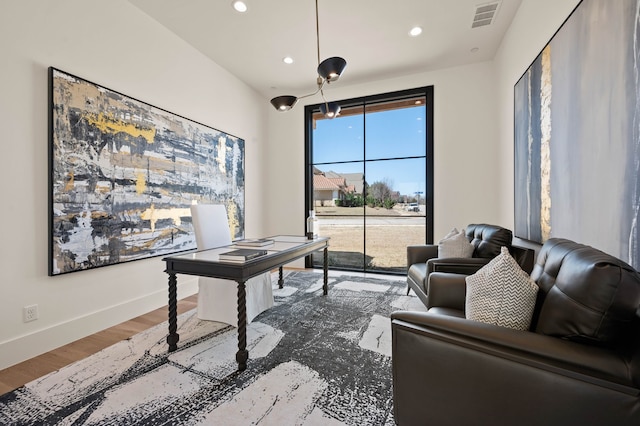 office featuring visible vents, recessed lighting, baseboards, and wood finished floors